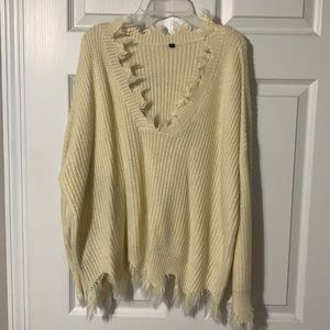 White frayed sweater